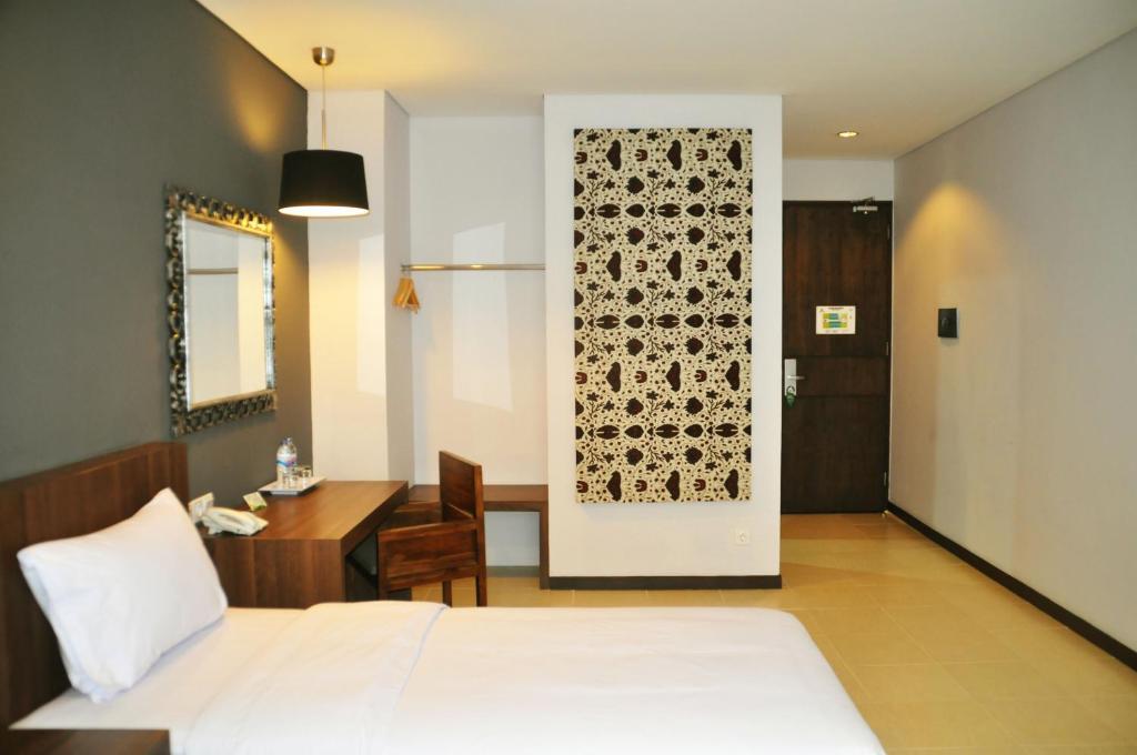 Praja Hotel Denpasar Szoba fotó